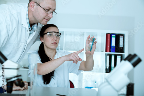 Two scientist  in laboratory