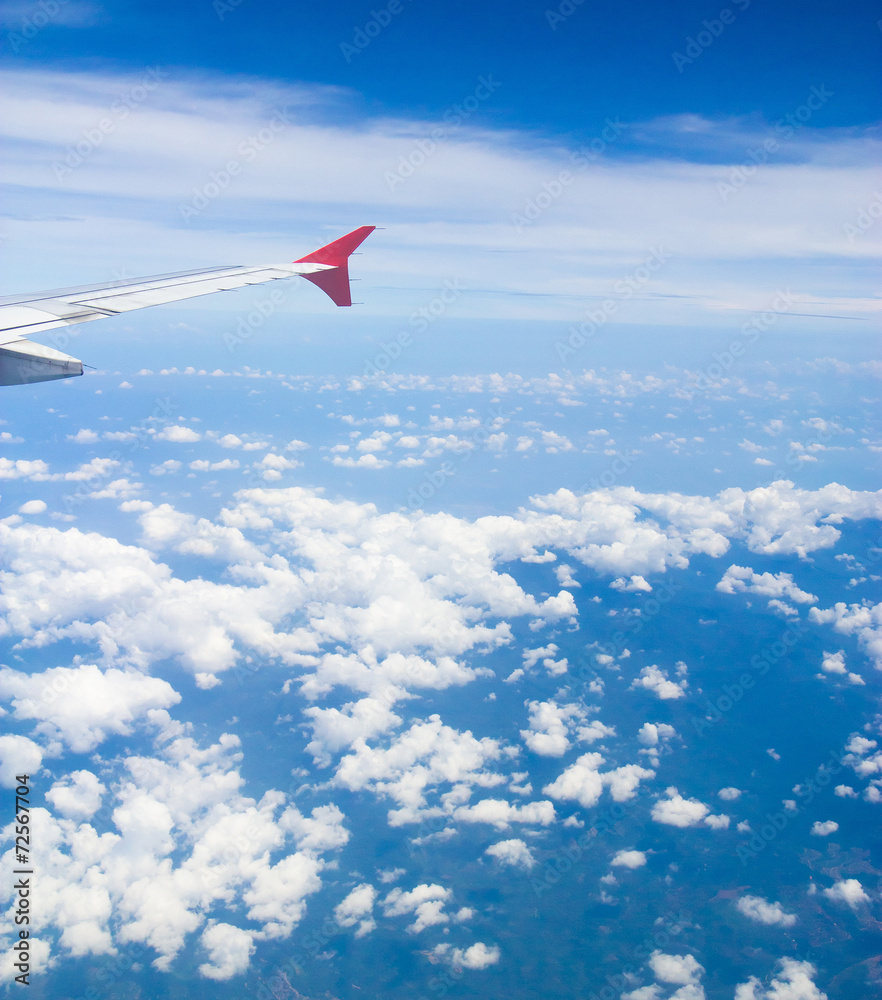 Cloudscape Around Wing over Lands Cloudscape Around Wing over Lands
