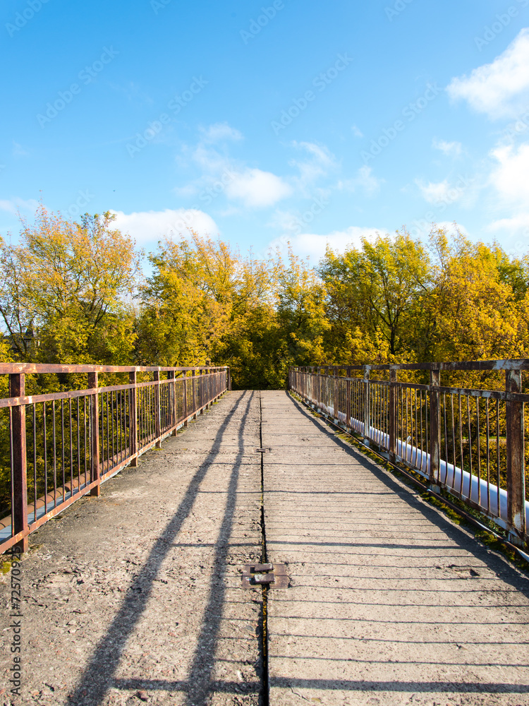 old bridge with rusty metal rails
