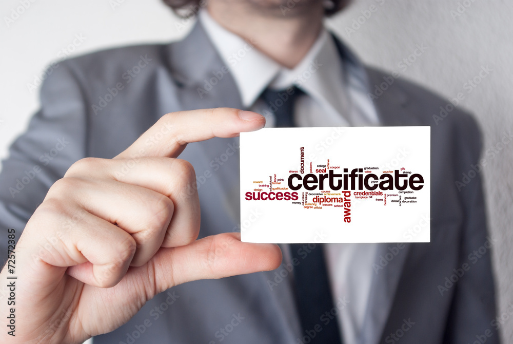 Certificate. Businessman in suit with a black tie showing or hol Certificate. Businessman in suit with a black tie showing or hol