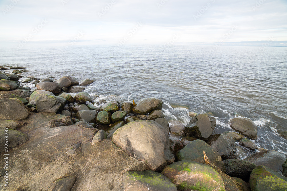 breakwater in the sea with lighthouse on it breakwater in the sea with lighthouse on it