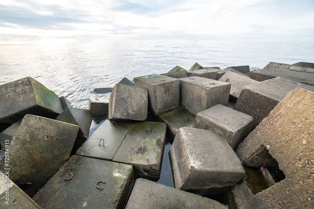 breakwater in the sea with lighthouse on it breakwater in the sea with lighthouse on it