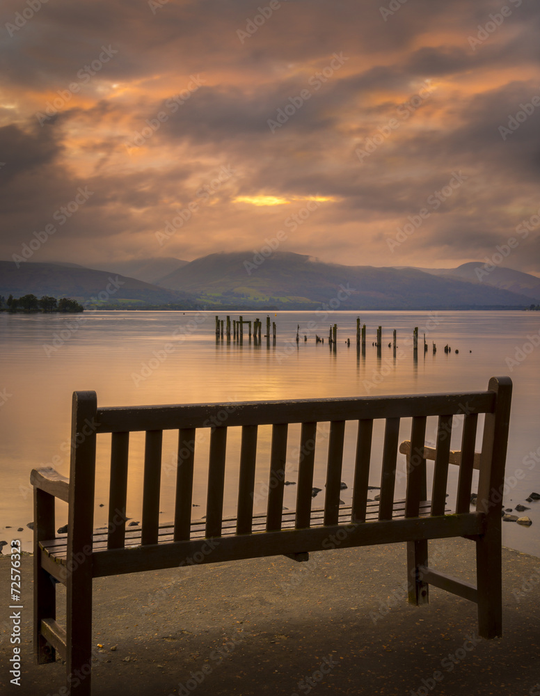 Loch Lomond jetty and mountains at sunset