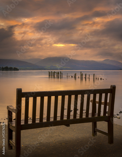 Loch Lomond jetty and mountains at sunset