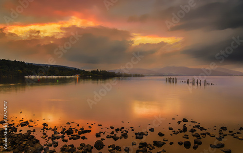 Loch Lomond jetty and mountains at sunset