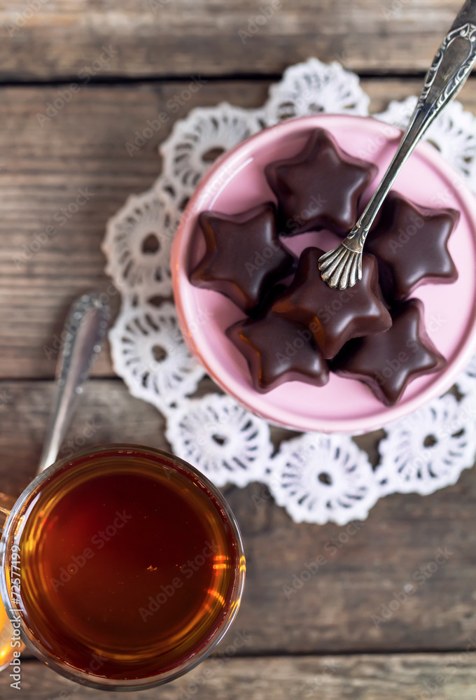 Chocolate stars and cup of rooibos tea. Chocolate stars and cup of rooibos tea.