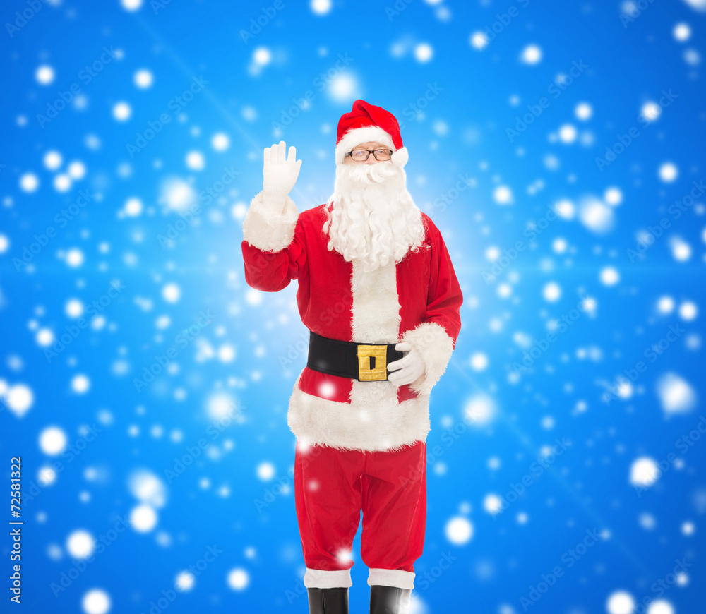 man in costume of santa claus man in costume of santa claus
