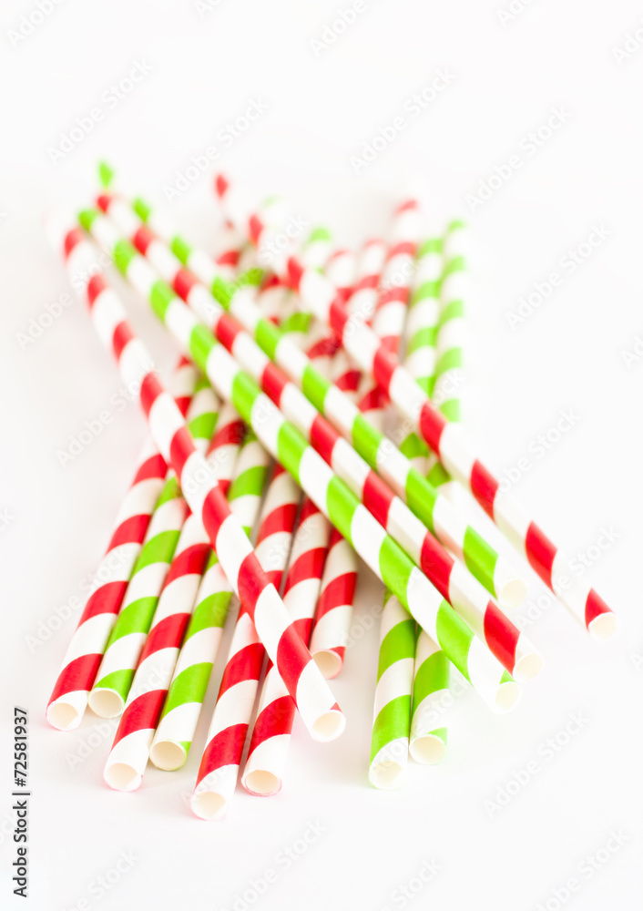Paper drink straws on white background
