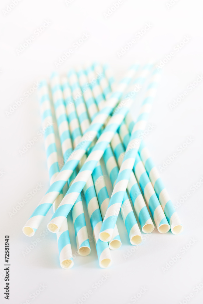Paper drink straws on white background