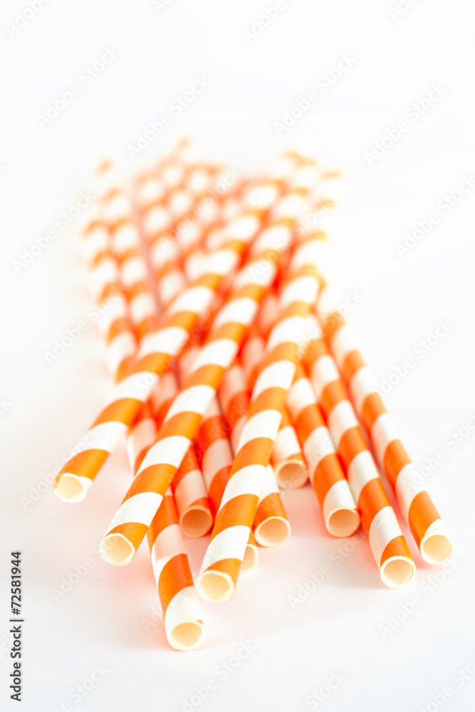 Paper drink straws on white background