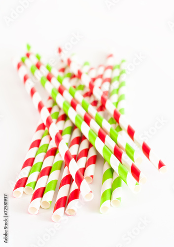 Paper drink straws on white background photo