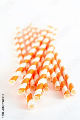 Paper drink straws on white background photo