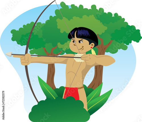 Indian child wielding a bow and arrow in the forest of Brazil.