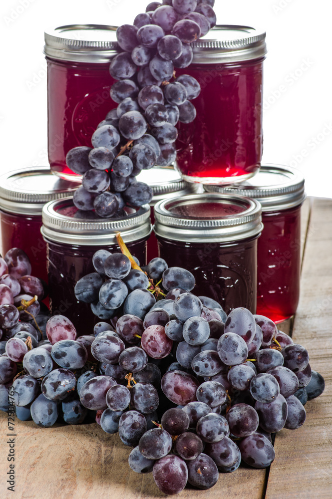 Bunches of grapes on jelly jars Bunches of grapes on jelly jars