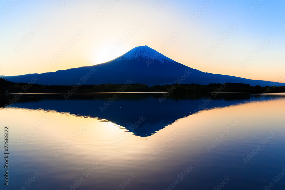 Sun shine and inverted Mount Fuji reflected in Lake Tanukiko Sun shine and inverted Mount Fuji reflected in Lake Tanukiko