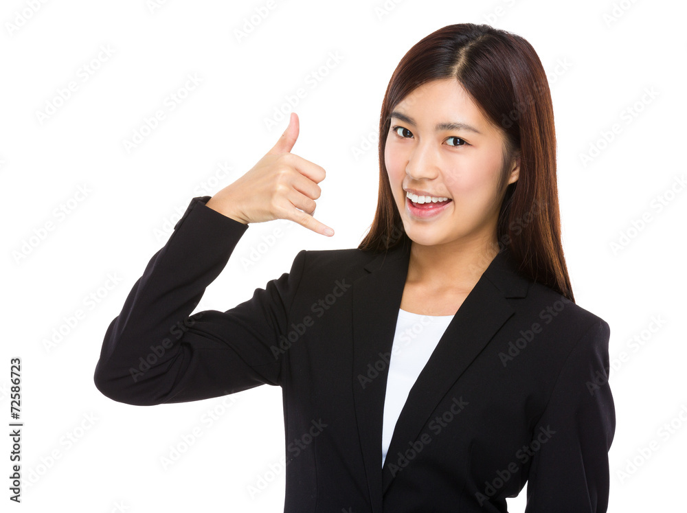 Businesswoman with hand show with call ma sign Businesswoman with hand show with call ma sign