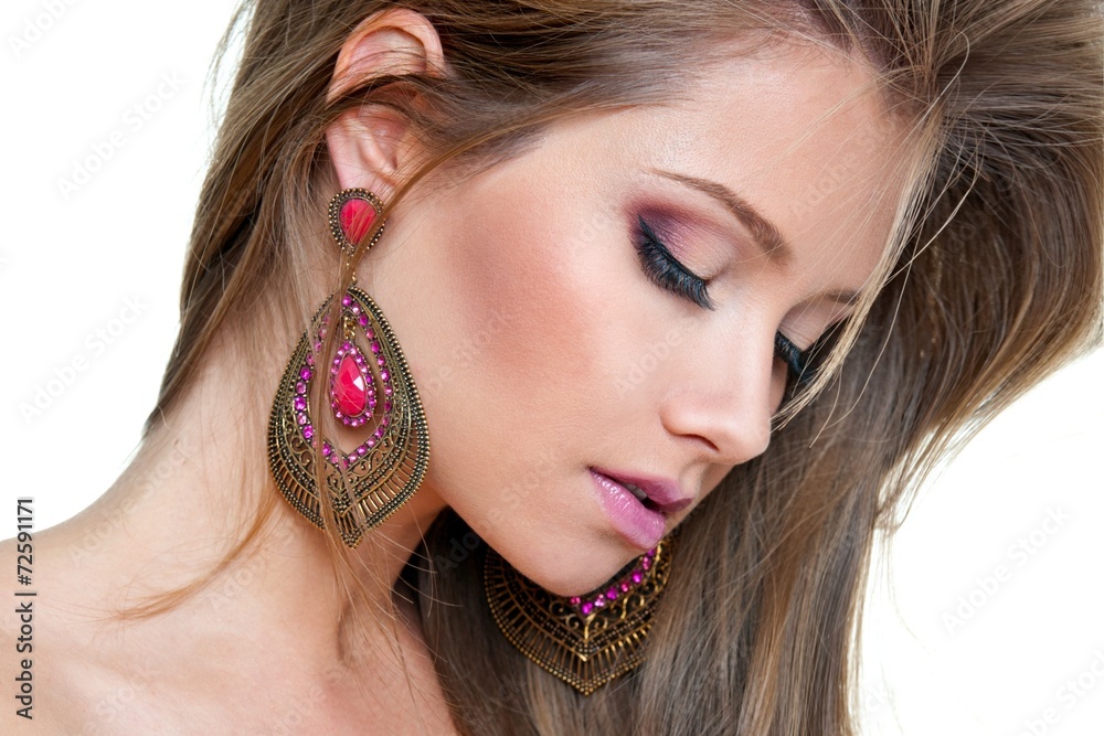 Obraz premium woman with long hair and big fashion pink earring