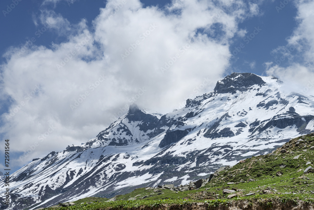 Fototapeta premium Clouded snow peaks