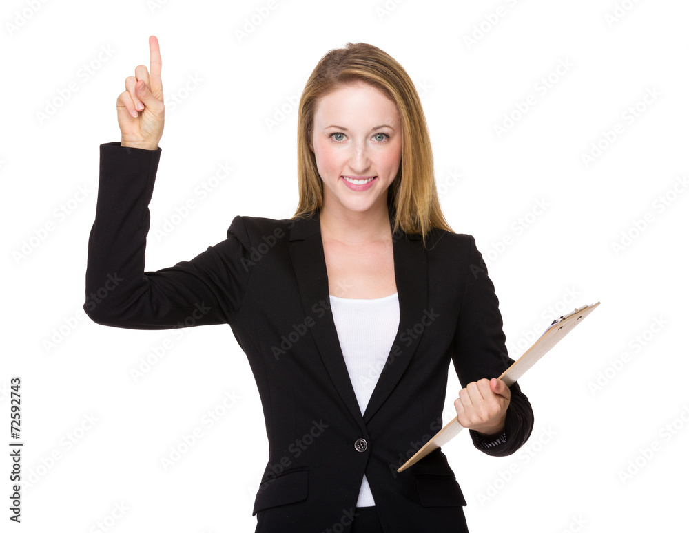 Businesswoman with clipboard and finger up Businesswoman with clipboard and finger up