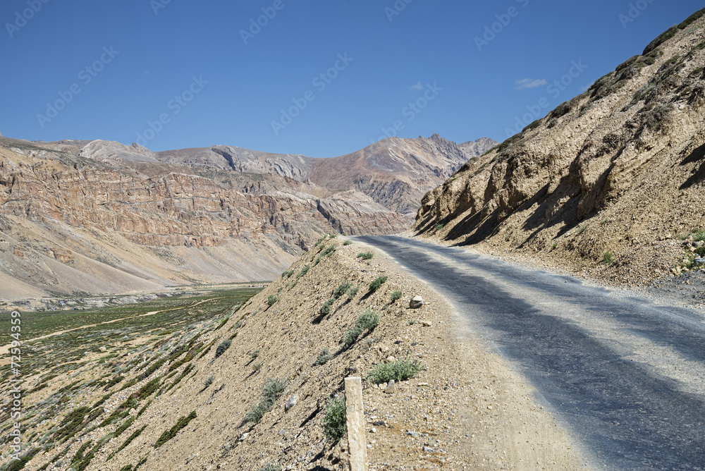 road at the side of canyon in mountains road at the side of canyon in mountains