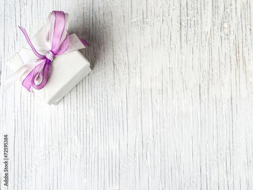 Gift box purple ribbon background
