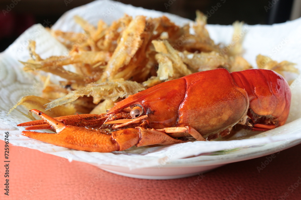 close-up macro boiled crawfish or crayfish and fish fried of lo close-up macro boiled crawfish or crayfish and fish fried of lo
