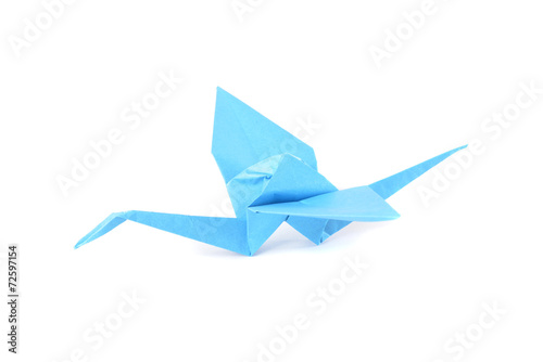 Origami crane over white