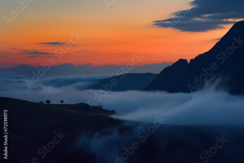 beautiful mountain landscape in foggy morning in Alba, Romania