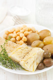 boiled cod fish with chick-pea and potato