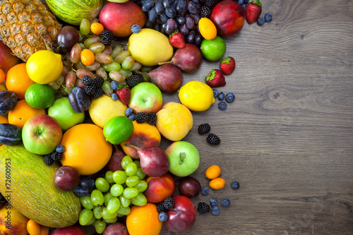 Mix of Fresh Fruits  on dark wooden table