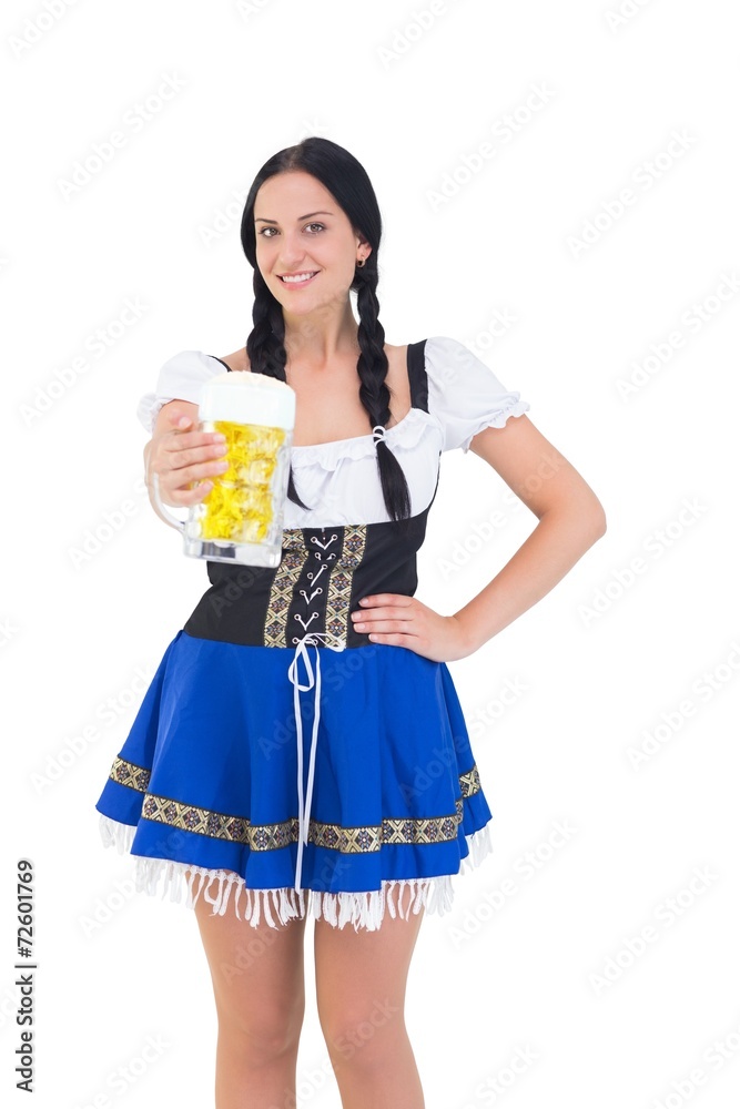 Pretty oktoberfest girl holding beer tankard Pretty oktoberfest girl holding beer tankard