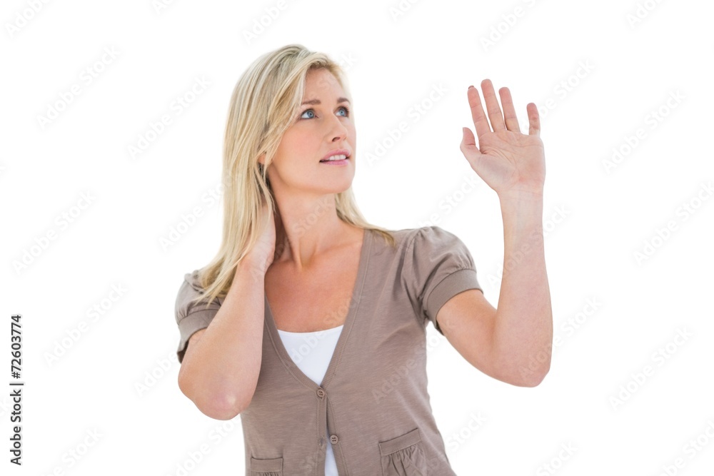 Happy blonde holding up her hand Happy blonde holding up her hand