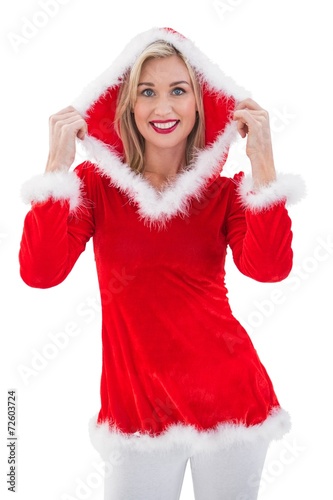 Festive blonde smiling at camera