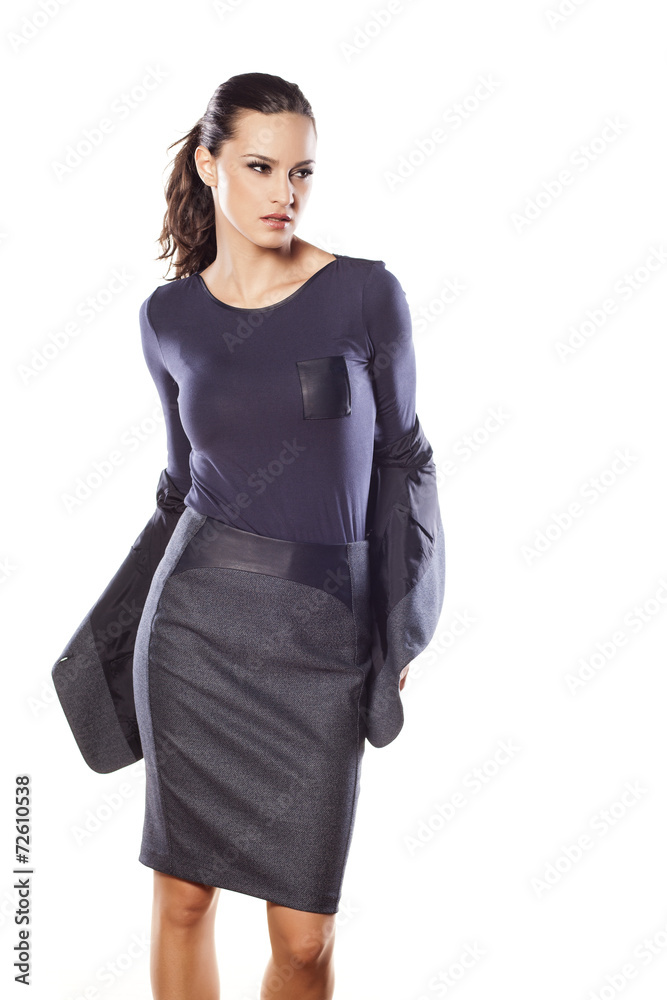 Beautiful business woman taking off her jacket Beautiful business woman taking off her jacket