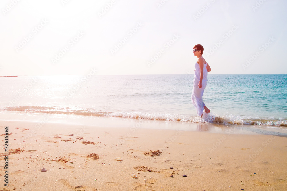 brunette woman on beach brunette woman on beach