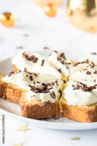 Pandoro slice with cream filling and chocolate chips