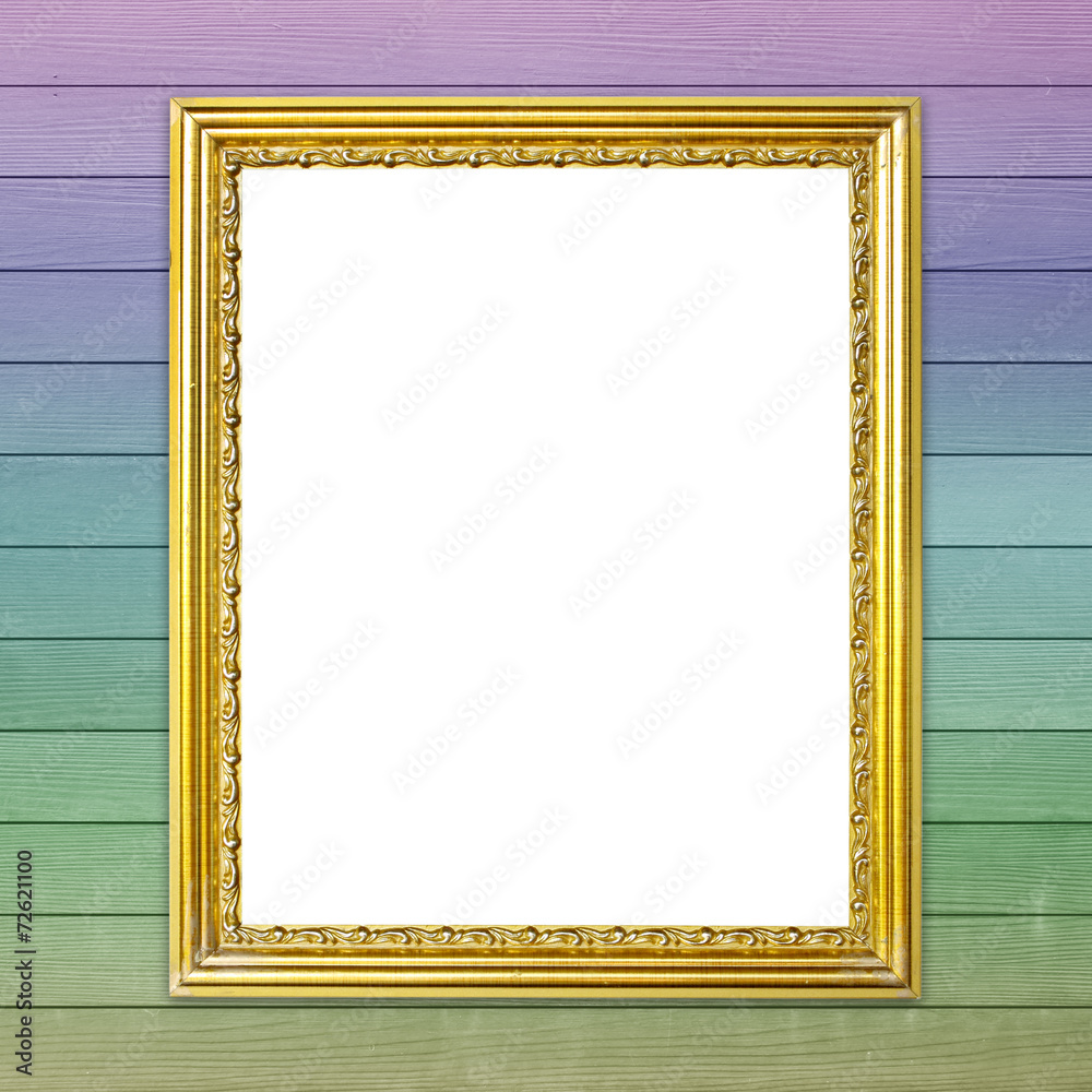 golden frame on colorful wood wall background golden frame on colorful wood wall background