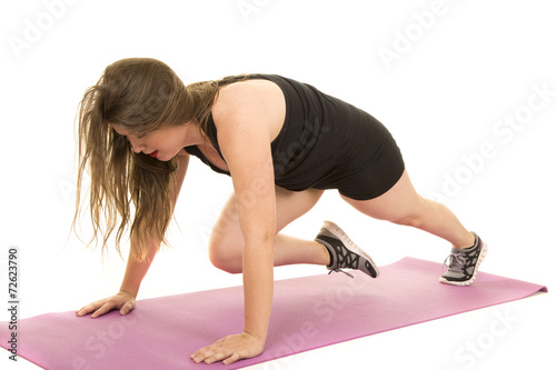 woman fitness black tank push up knee up