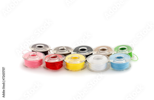 Set of colorful spools of thread