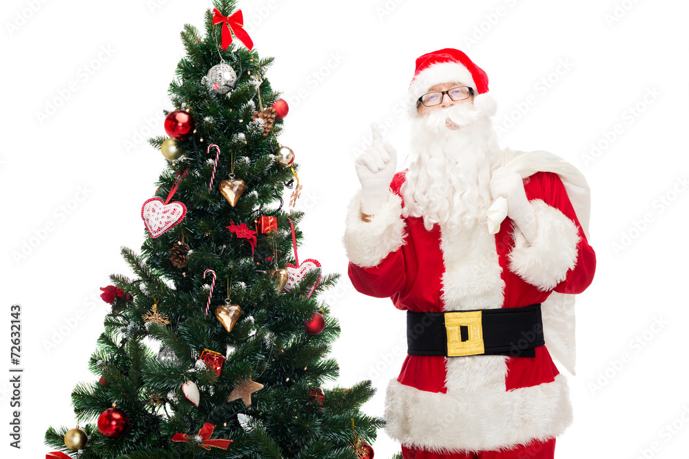 santa claus with bag and christmas tree santa claus with bag and christmas tree