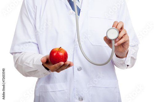 Asian male doctor with stethoscope and apple