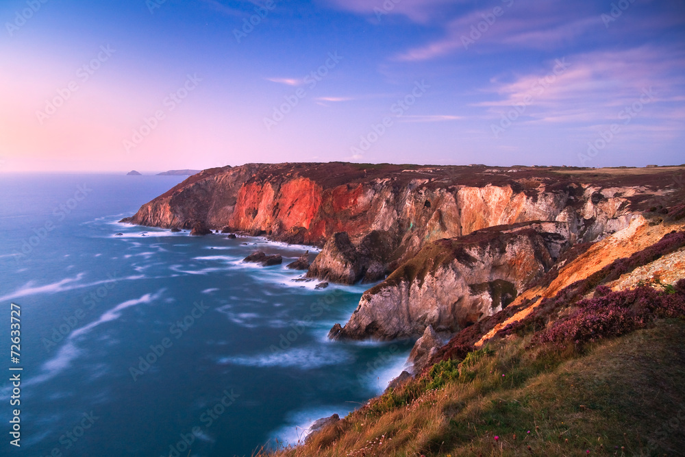 Cliffs coloured by different minerals, Cornwall, UK. Cliffs coloured by different minerals, Cornwall, UK.