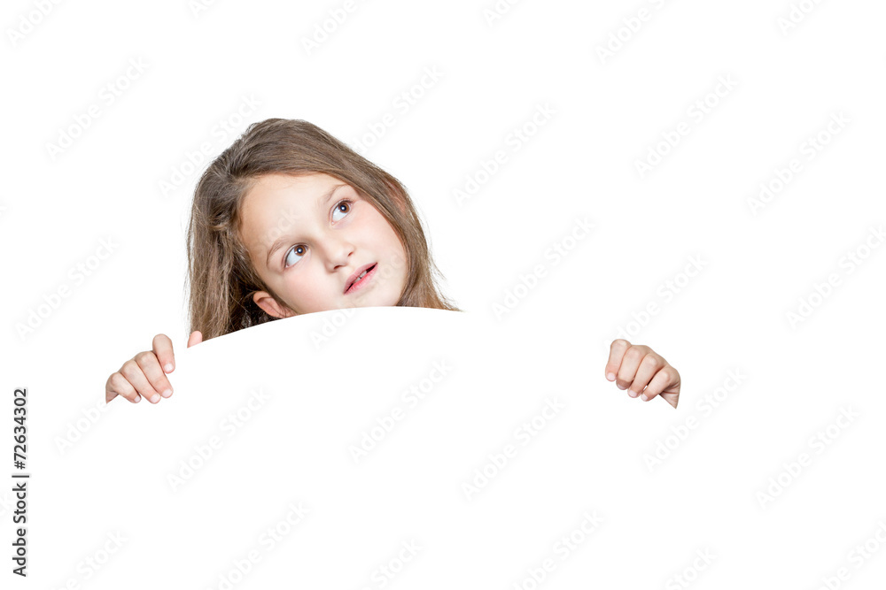 Girl peeping from behind a round white panel Girl peeping from behind a round white panel