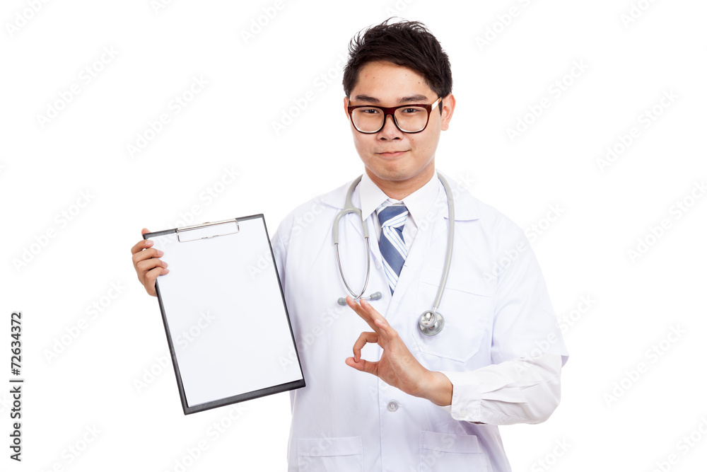 Asian male doctor show OK sign with clipboard Asian male doctor show OK sign with clipboard