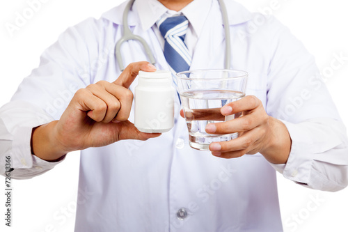 Asian male doctor with pharmacy bottle and water