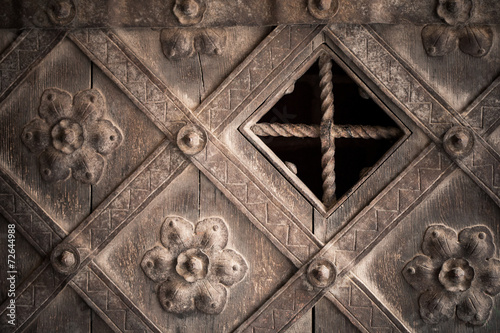 Architectural detail. Part decorative old wooden door 