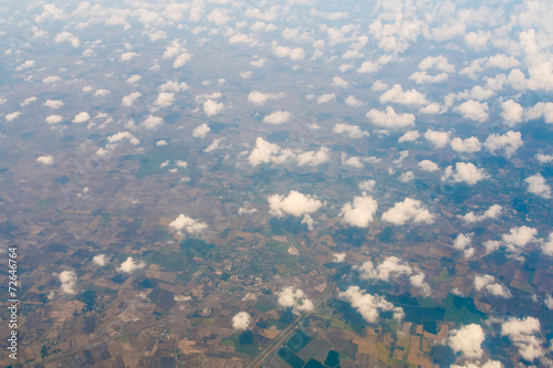 Bild auf Leinwand Aerial view of clouds and village