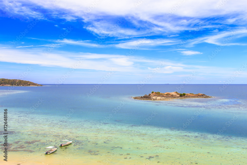 Fototapeta premium Aerial view of crystal clear water on tropical island