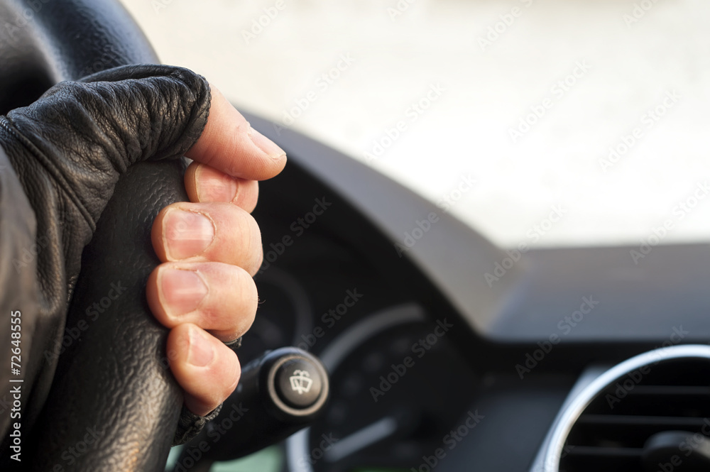 Hand on a Sterring Wheel