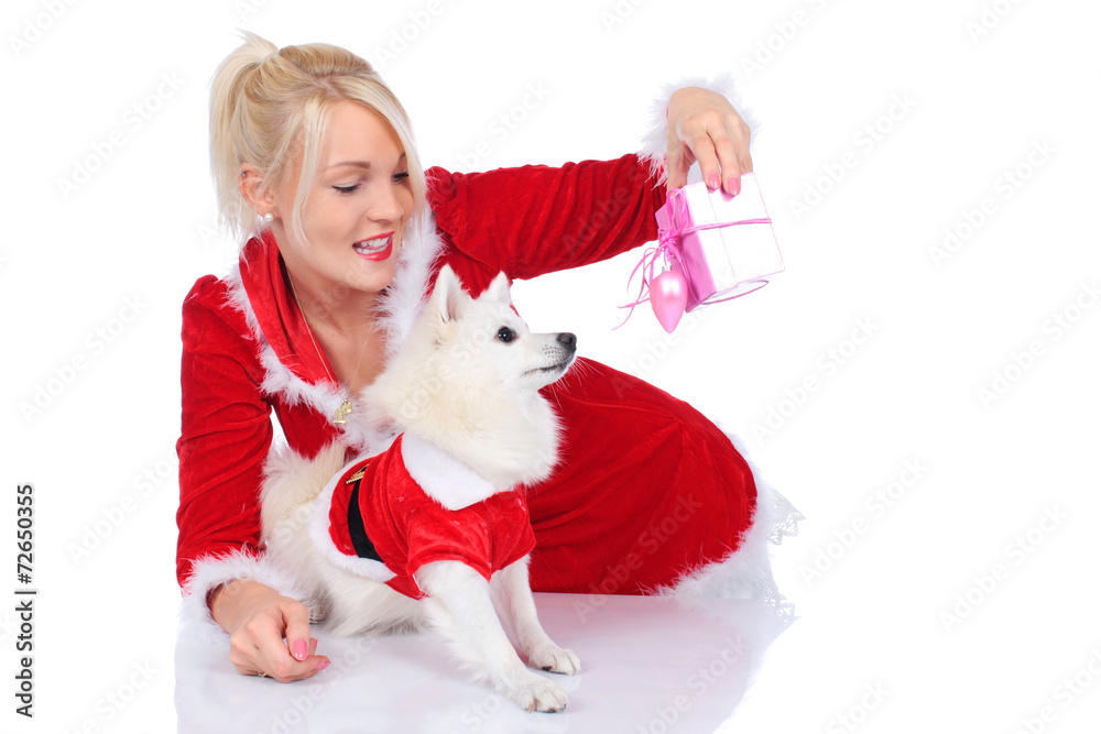 Niedlicher Spitz mit Weihnachtsfrau Niedlicher Spitz mit Weihnachtsfrau